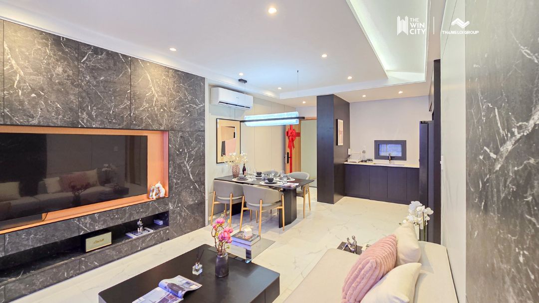 Khu vực bếp chữ L hiện đại và tiện nghi của căn hộ 3PN The Win City